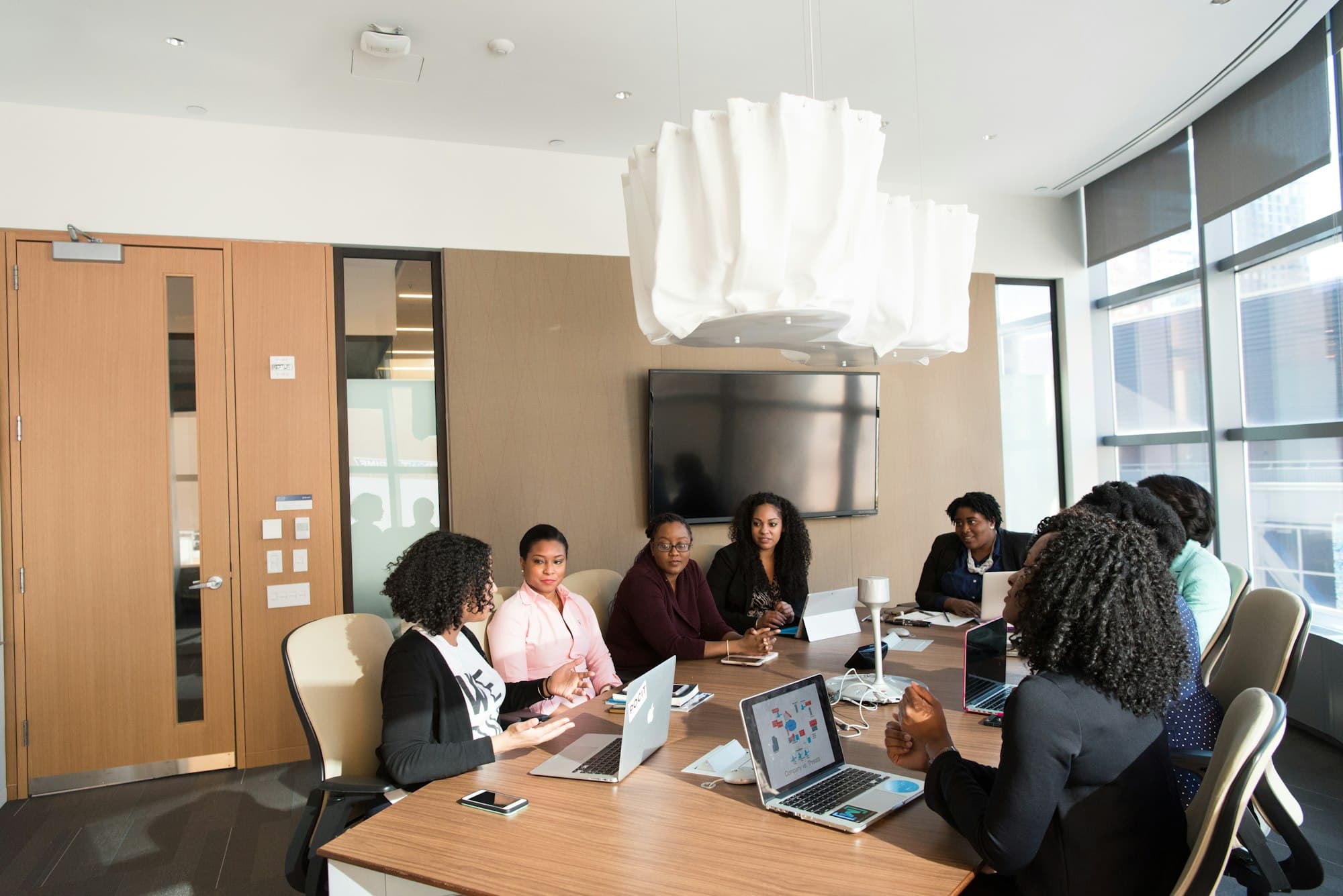 Team working at laptops in an open-plan office