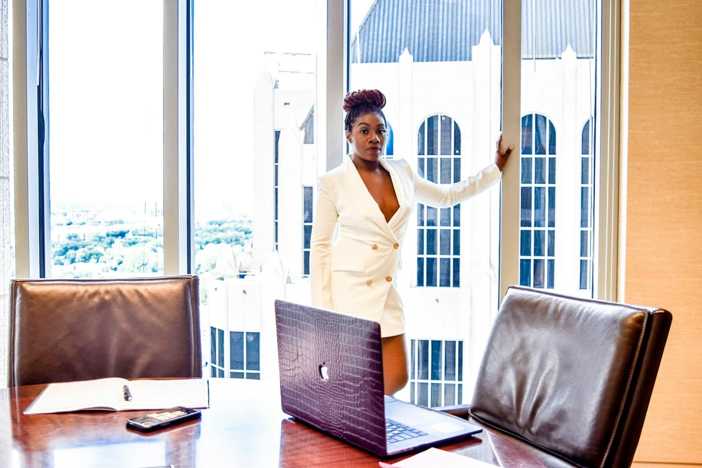 Professional working on documents at a laptop
